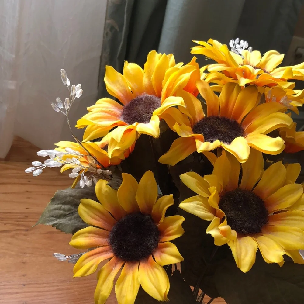 Faux sunflower florals with jewels in milk jar